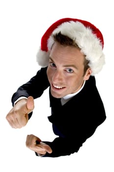 caucasian businessman with cheerup and santa cap on an isolated white background