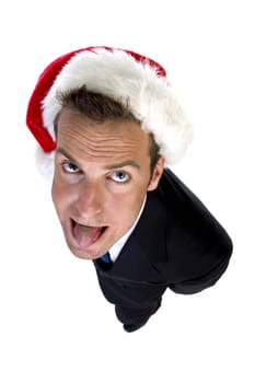 businessman wearing santa cap and teasing with tongue with white background