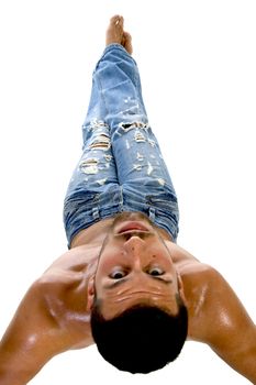 male lying down and looking backwards against white background