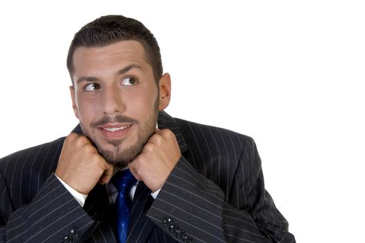 executive putting his chin in hands on an isolated white background