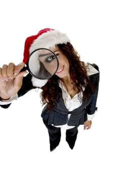 female holding magnifier with white background