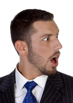 shocked young executive on an isolated white  background