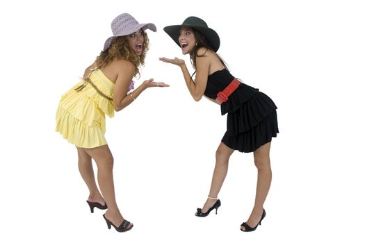 cheerful bending females on isolated studio picture