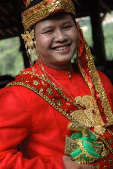 young asian groom wearing traditional costume from makasar-indonesia