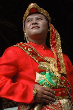 young asian groom wearing traditional costume from makasar-indonesia