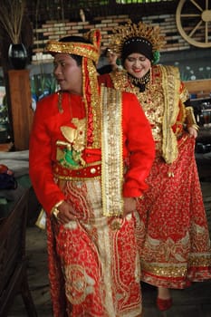 bride and groom wearing traditional costume from makasar-indonesia