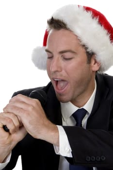 businessman singing into a microphone against white background