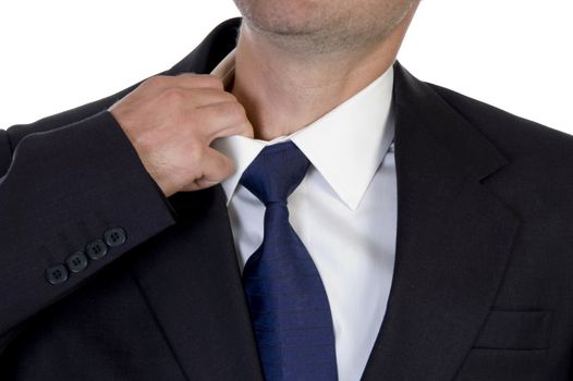 man itching his neck with hand on an isolated background