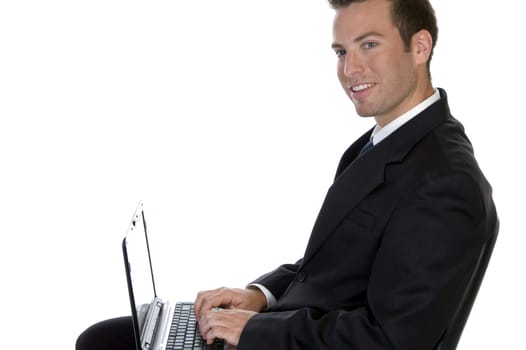 successful businessman with laptop against white background