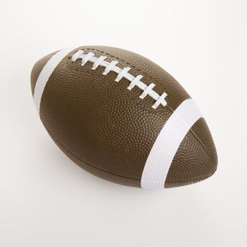 American football on white background.