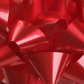 Close-up of big red Christmas bow.