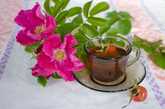 The image of a cup of tea from a dogrose