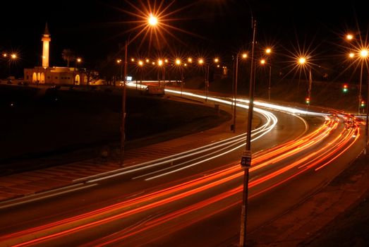 Night view of the lights of moving cars. 