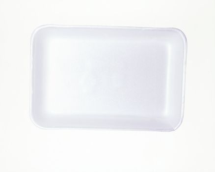 White styrofoam plate on white background
