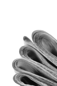 pile of news papers on white background