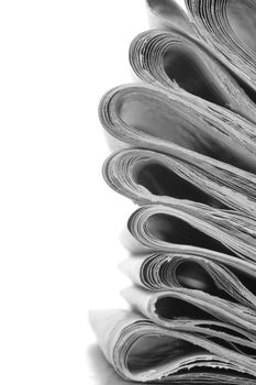 pile of news papers on white background