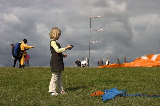 girl with kite in the open air