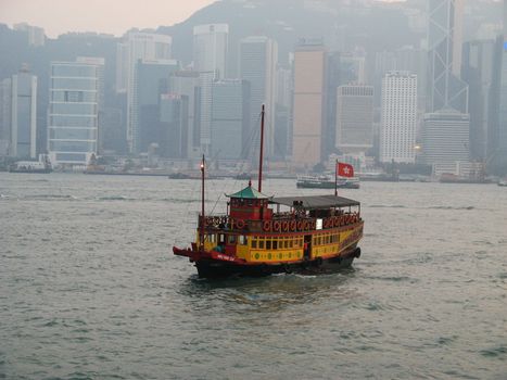Little shuttle ship in Hong Kong harbor