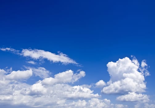 Clouds over a deep blue sky in the Mediterranean