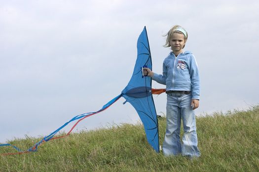 girl with kite in the open air