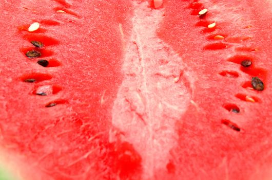 Red juicy ripe water-melon. A background