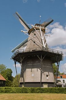 The Dutch windmill, the Zandhaas (the Sand-hare) on a sunny day. The windmill is still used for wheat grinding on a daily basis.