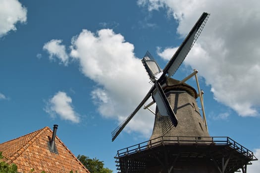 The Dutch windmill, the Zandhaas (the Sand-hare) on a sunny day. The windmill is still used for wheat grinding on a daily basis.