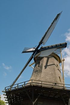 The Dutch windmill, the Zandhaas (the Sand-hare) on a sunny day. The windmill is still used for wheat grinding on a daily basis.