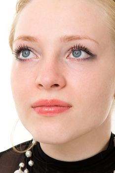 The beautiful face close up. Portrait of the young woman.