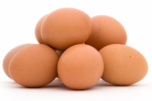 Heap of eggs on a white background