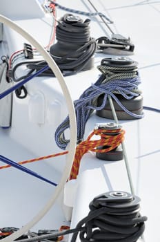 Detail of a sailboat with winches and ropes