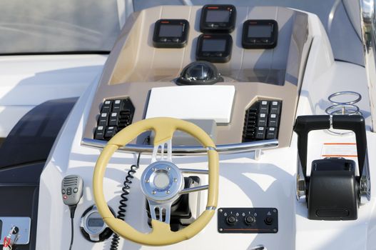 Instruments panel and steering wheel of a motorboat