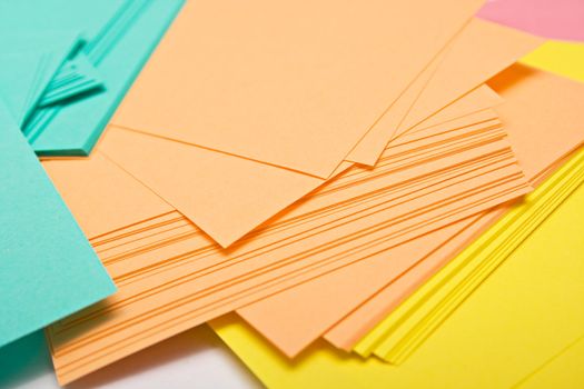 Pile of a pure paper for notes on a white background. A background, shallow DOF