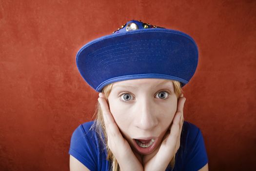 Close up portrait of shocked teenage girl