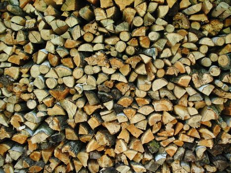 Wall of firewood texture background