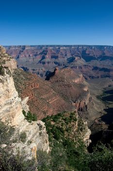 Morning sunrise at the Grand Canyon with blue sky