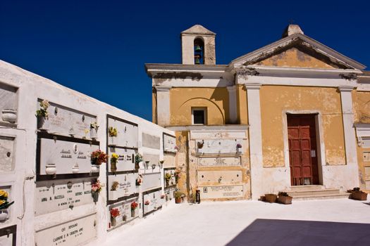 Old church and cemetery against a blue sky on Ponza island, Italy