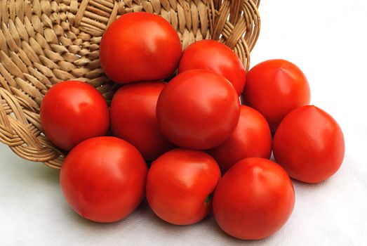 red tomato and hand made woode basket