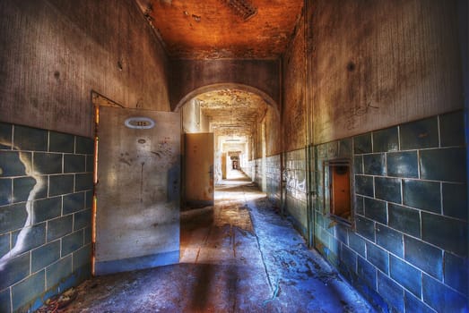 Long corridor in an old abandoned building