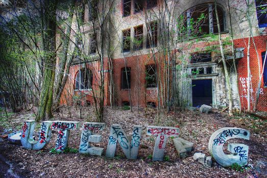 entrance of a ruin with a welcoming message