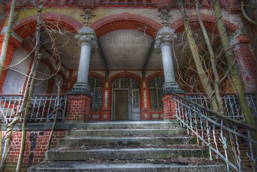 details of the entrance of an abandoned building