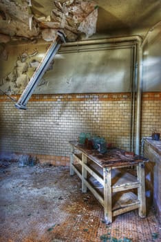 abandoned room with a cupboard of chemicals