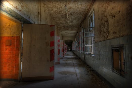 Long corridor in an old abandoned building