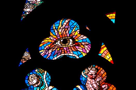 Detail of the color window - bullseye pane - "Eye of God"
St Vitus cathedral, Prague, Czech republic, Europe.
Design: Frantisek Kysela - 1929