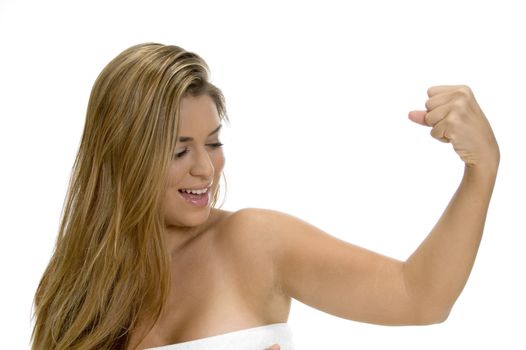 posing strong blonde lady with white background