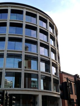 A modern office building that is curved.