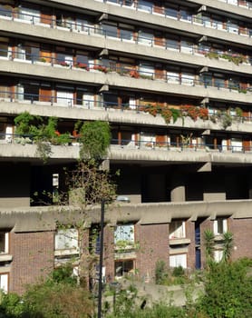 The side of a block of flats that are designed in the brutalist style.