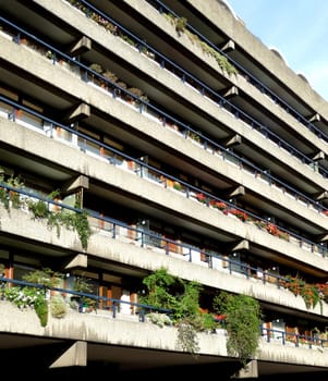 The side of a block of flats that are designed in the brutalist style.