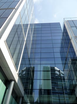 A modern glass building in central London.