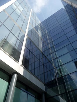 A modern glass building in central London.
